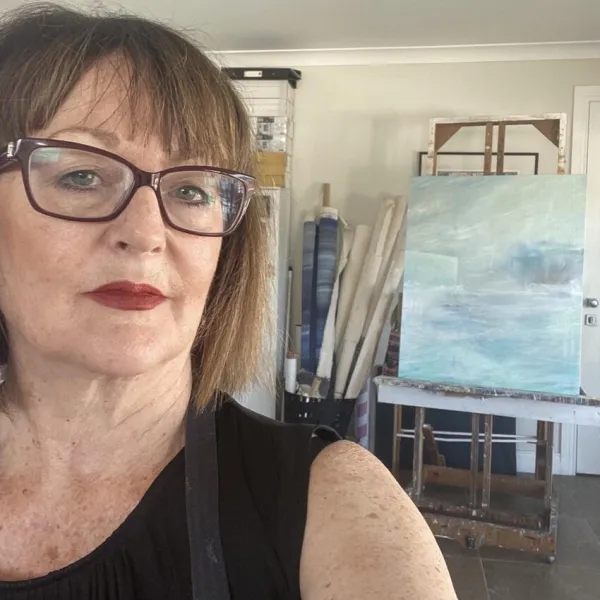 A picture of Liza with her art