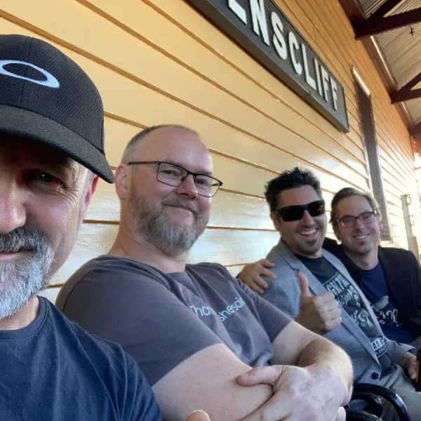 Blues musicians lined up at the train station