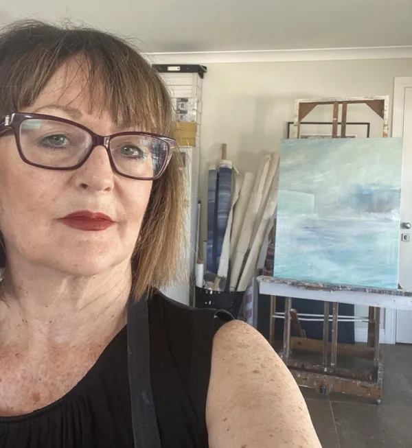 A picture of Liza with her art